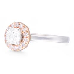 Platinum and 18ct rose gold round brilliant cut diamond halo cluster ring, the principal white diamond of 0.52 carat, with GIA report, colour D, clarity VS1, surrounded by pink diamonds of approx 0.20 carat, hallmarked