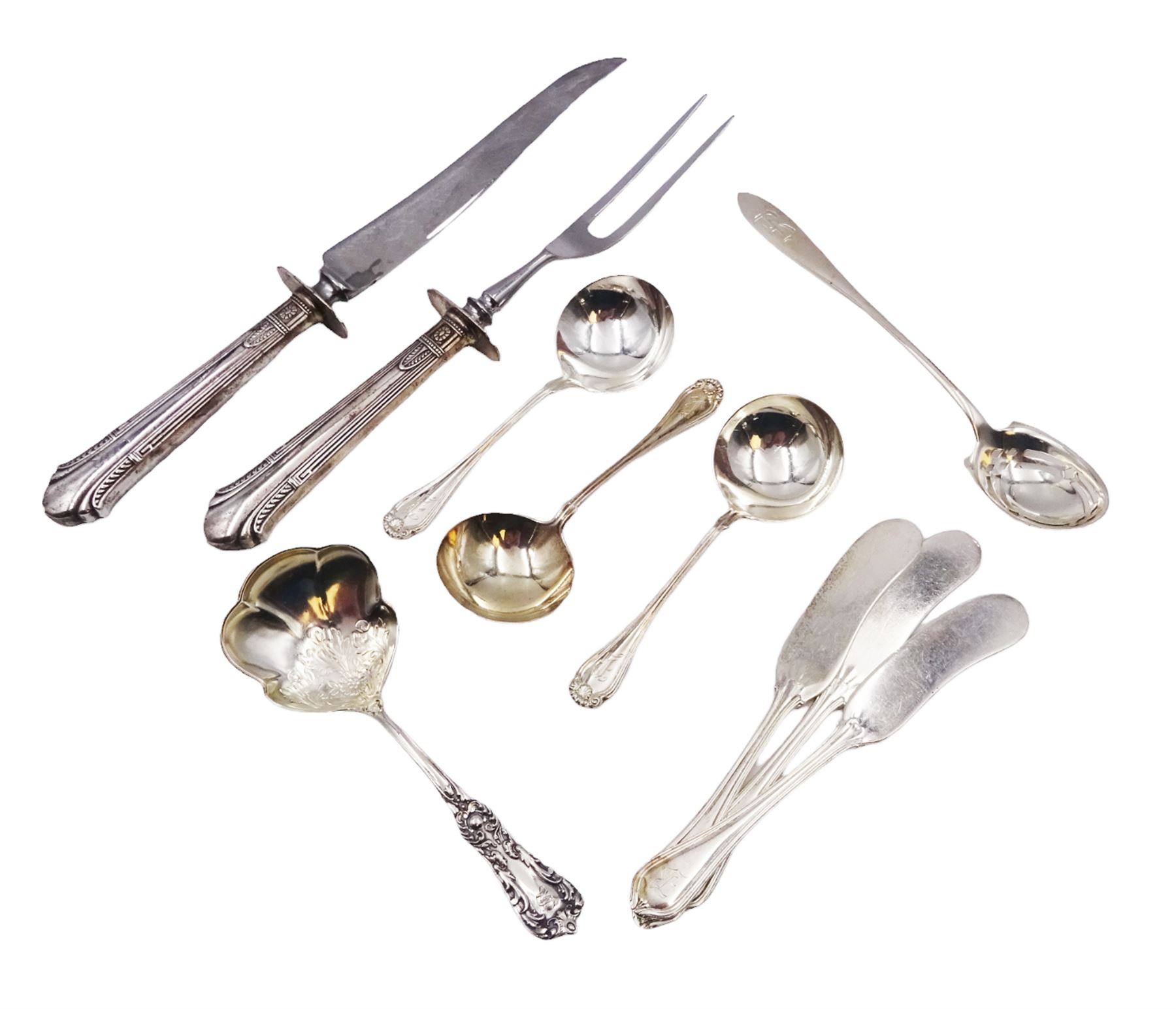 Group of silver flatware, comprising pair of American silver handled carvers and sifting spoon, three butter knives, etc