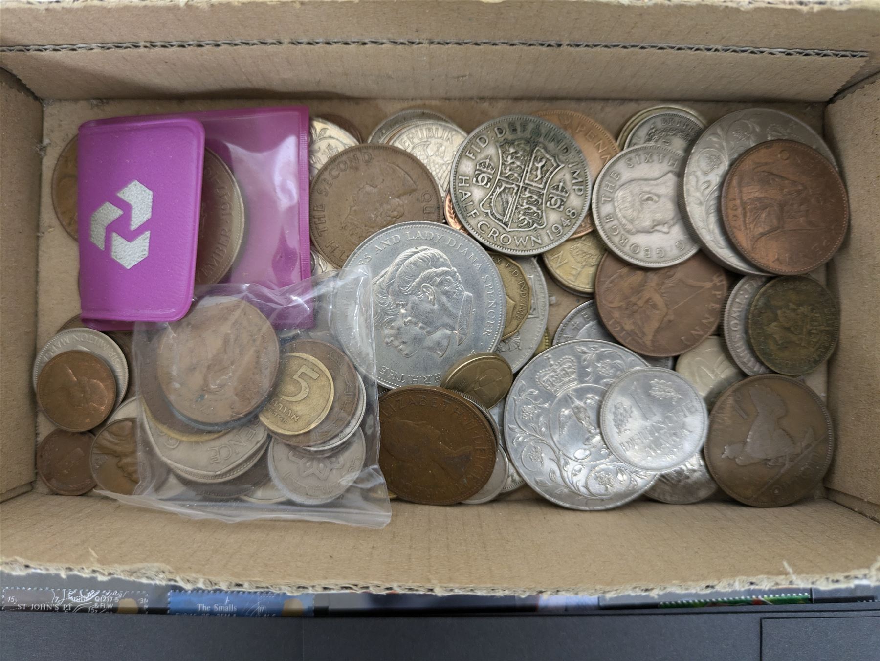 Coins and stamps including King George V 1936 one shilling, King George VI 1941 two shillings, other pre-decimal coinage, commemorative crowns, various Queen Elizabeth II decimal commemorative mint stamps housed on stockcards, World stamps with Australia, Austria, Barbados, Bermuda, Bulgaria, Canada, Ceylon, Egypt etc, housed in an album and loose