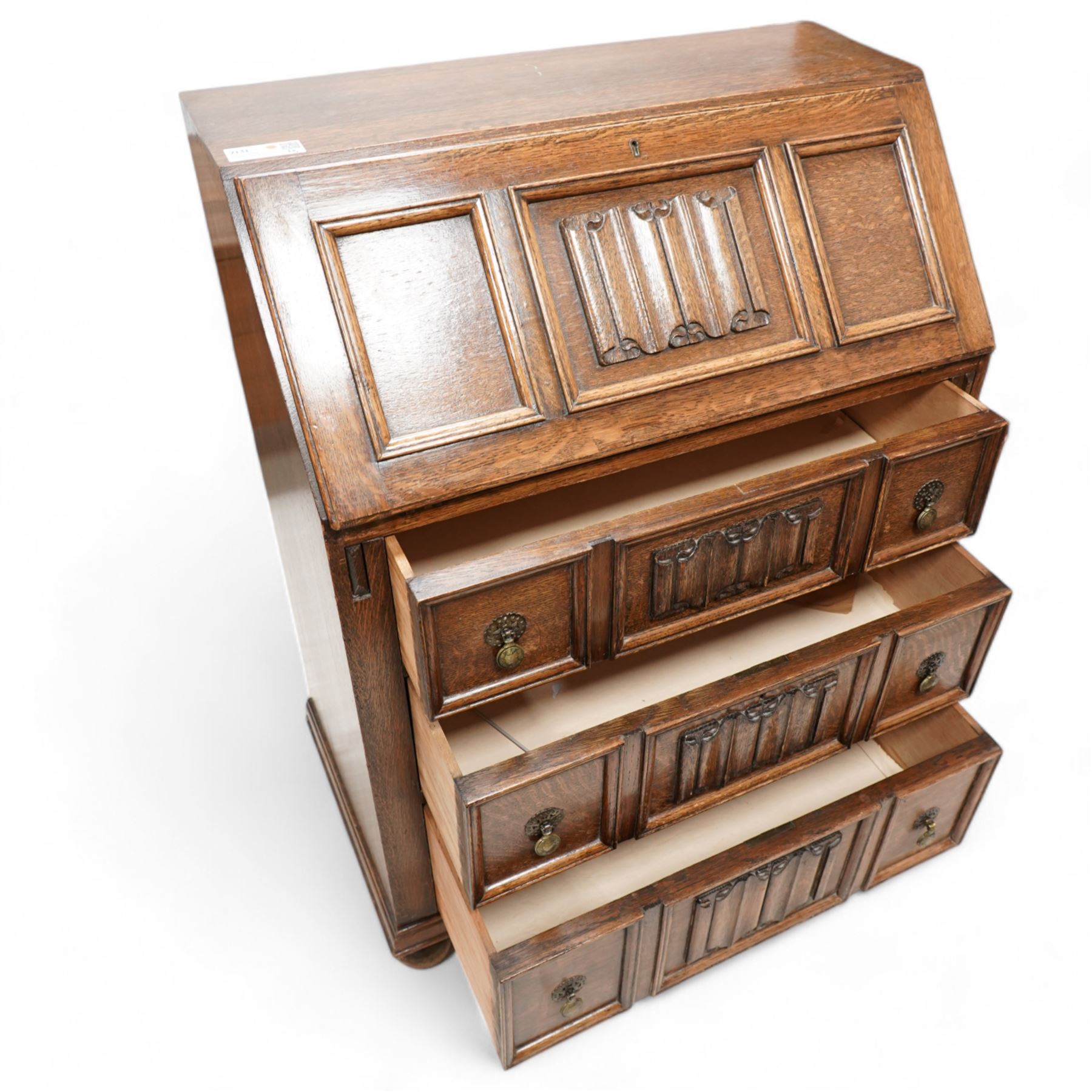 Mid-20th century oak bureau, fitted with fall front above three drawers