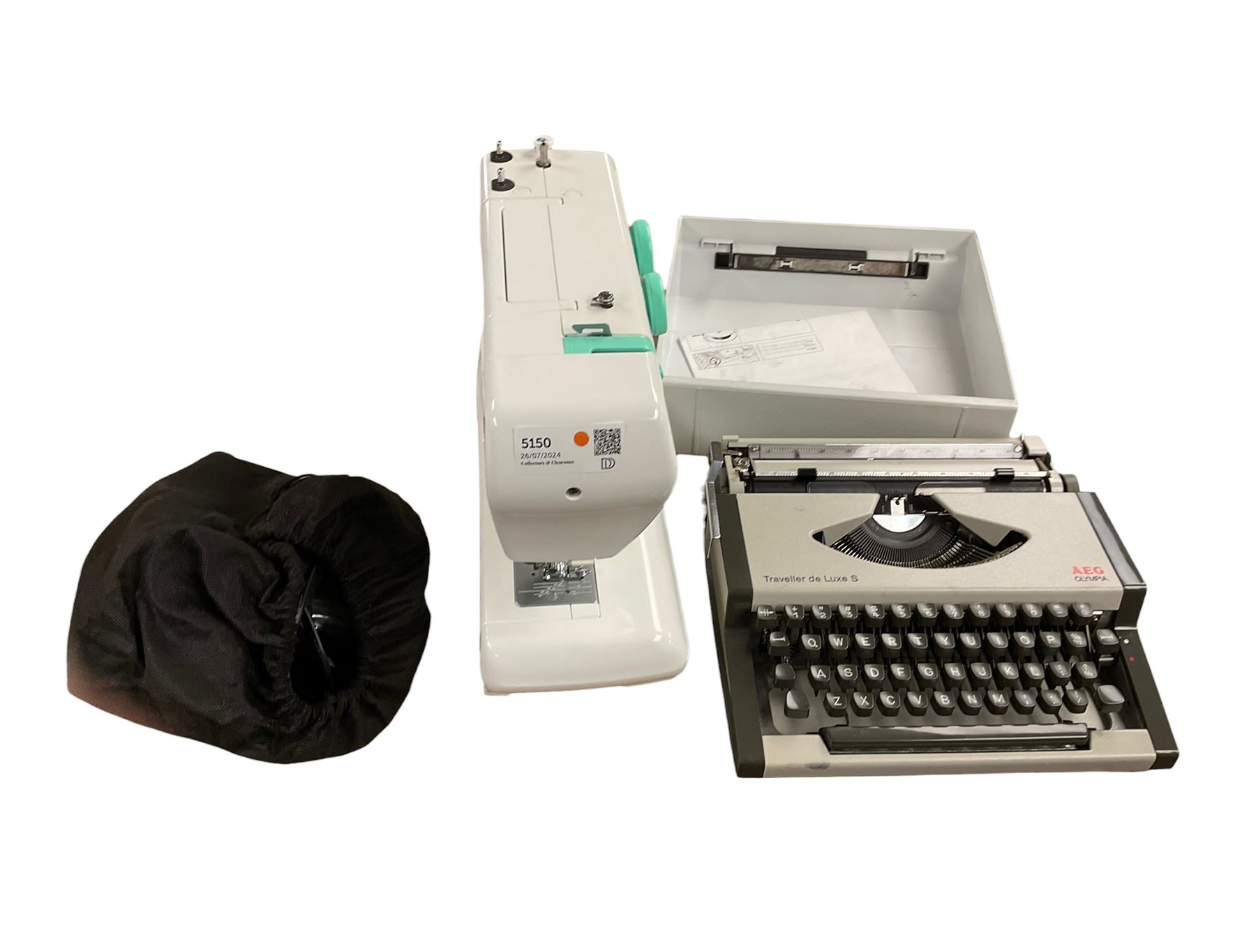 Janome sewing machine, together with Aeg Olympia typewriter 