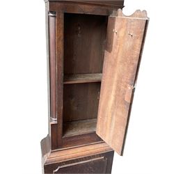 Empty oak longcase converted into a cupboard with shelves.