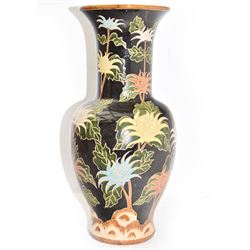 Floor vase with stylised flowers on a black ground, H84cm