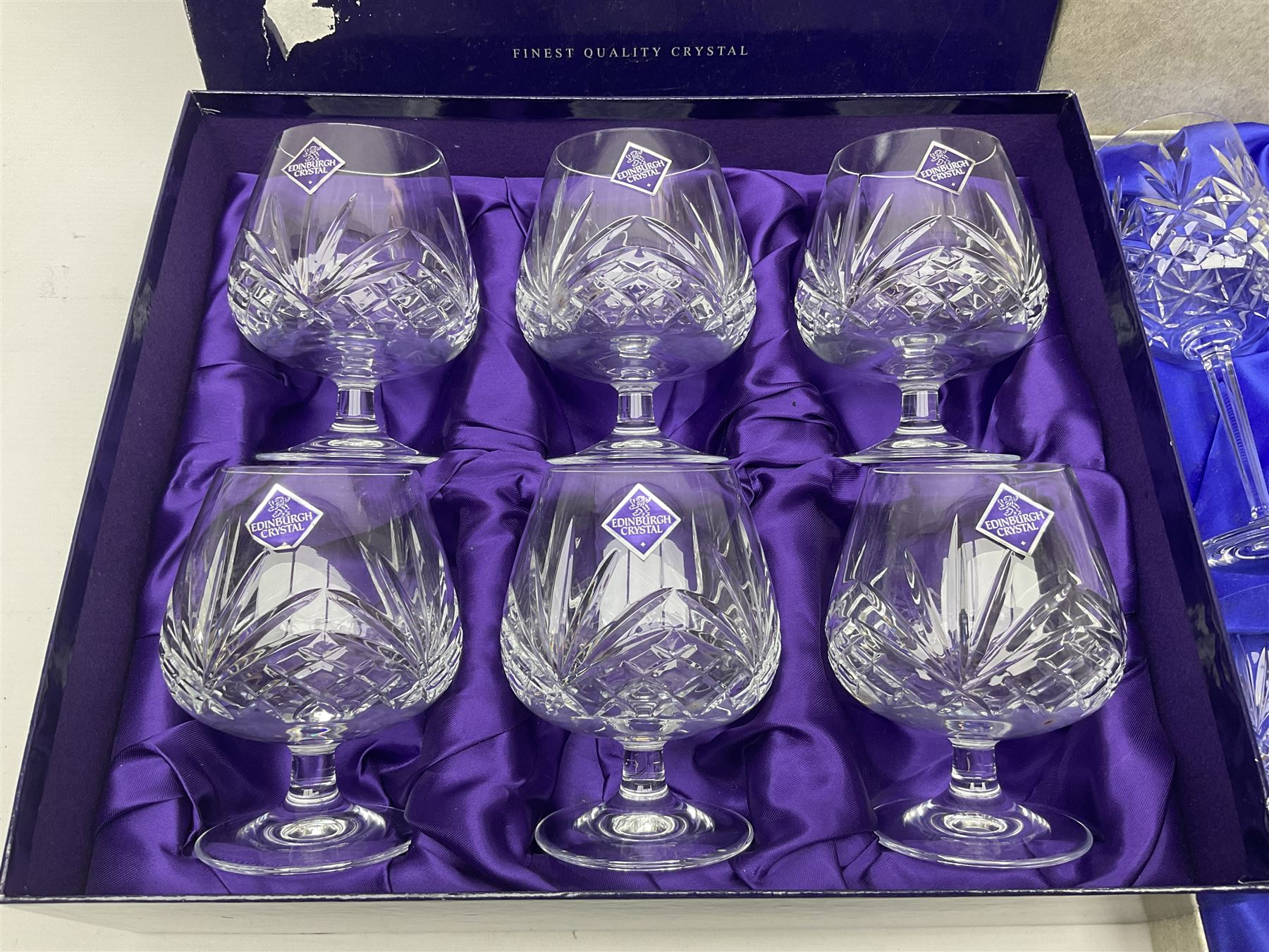 Set of six Edinburgh Crystal Continental Collection wine glasses, together with a set of six Edinburgh Crystal brandy glasses, both boxed