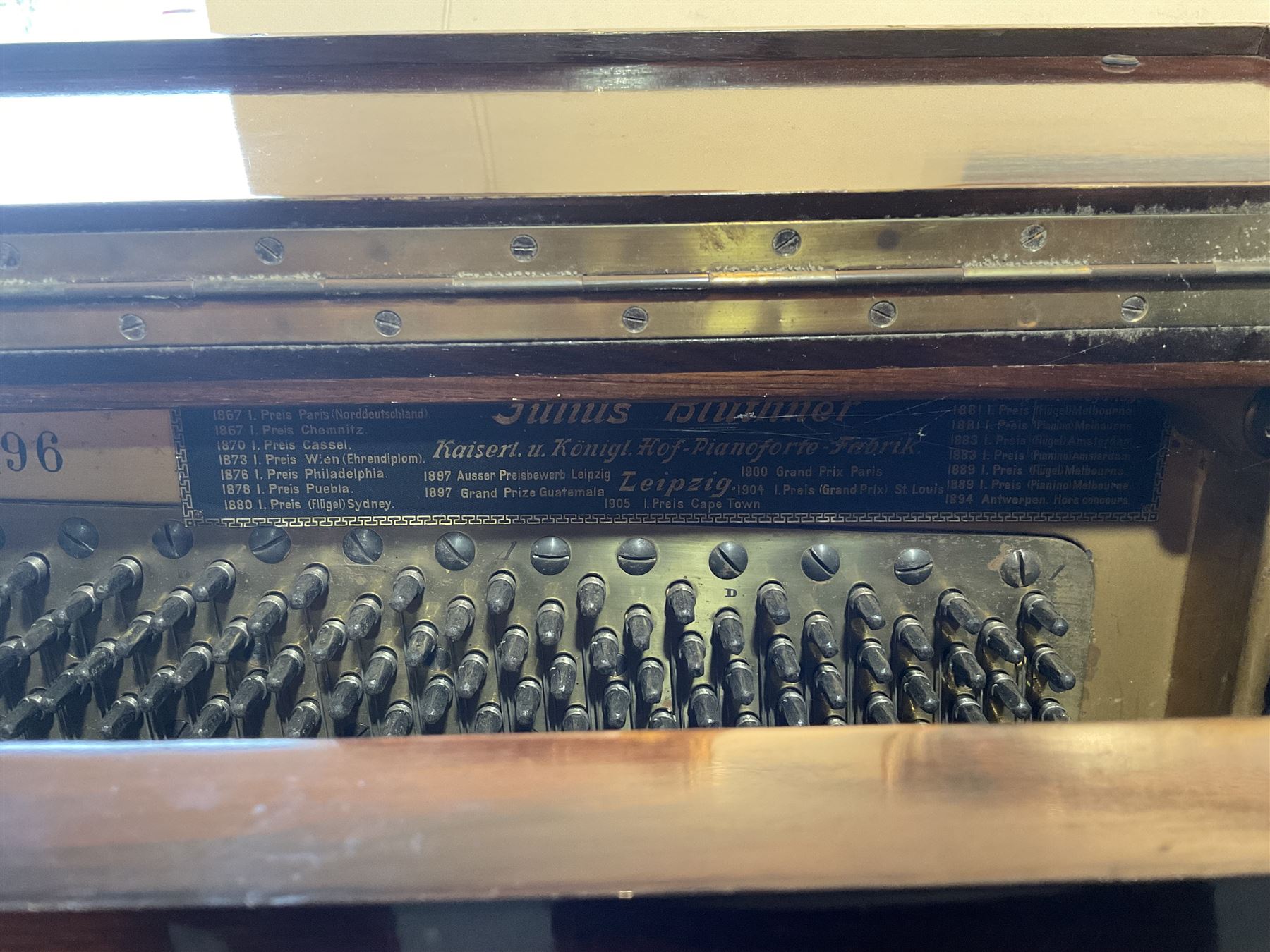 Bluthner of Leipzig - Early 20th century overstrung upright piano, serial number 79496 (1910), in a mahogany case with three front case panels and folding music desk, with 85 keys (seven octaves) underdamper action, original hammers, stringing, tuning pins, dampers and felts, with sostenuto and sustain pedals. Julius Bluthner was considered to be one of the the best makers of German upright pianos in the early 20th century both for tone quality and build. 

This item has been registered for sale under Section 10 of the APHA Ivory Act.