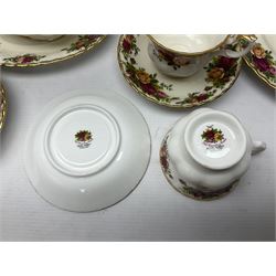 Royal Albert Old Country Roses pattern coffee set for four, comprising coffee pot, milk jug, cups and saucers, cake plate, together with six dinner plates, side plates etc (34) 