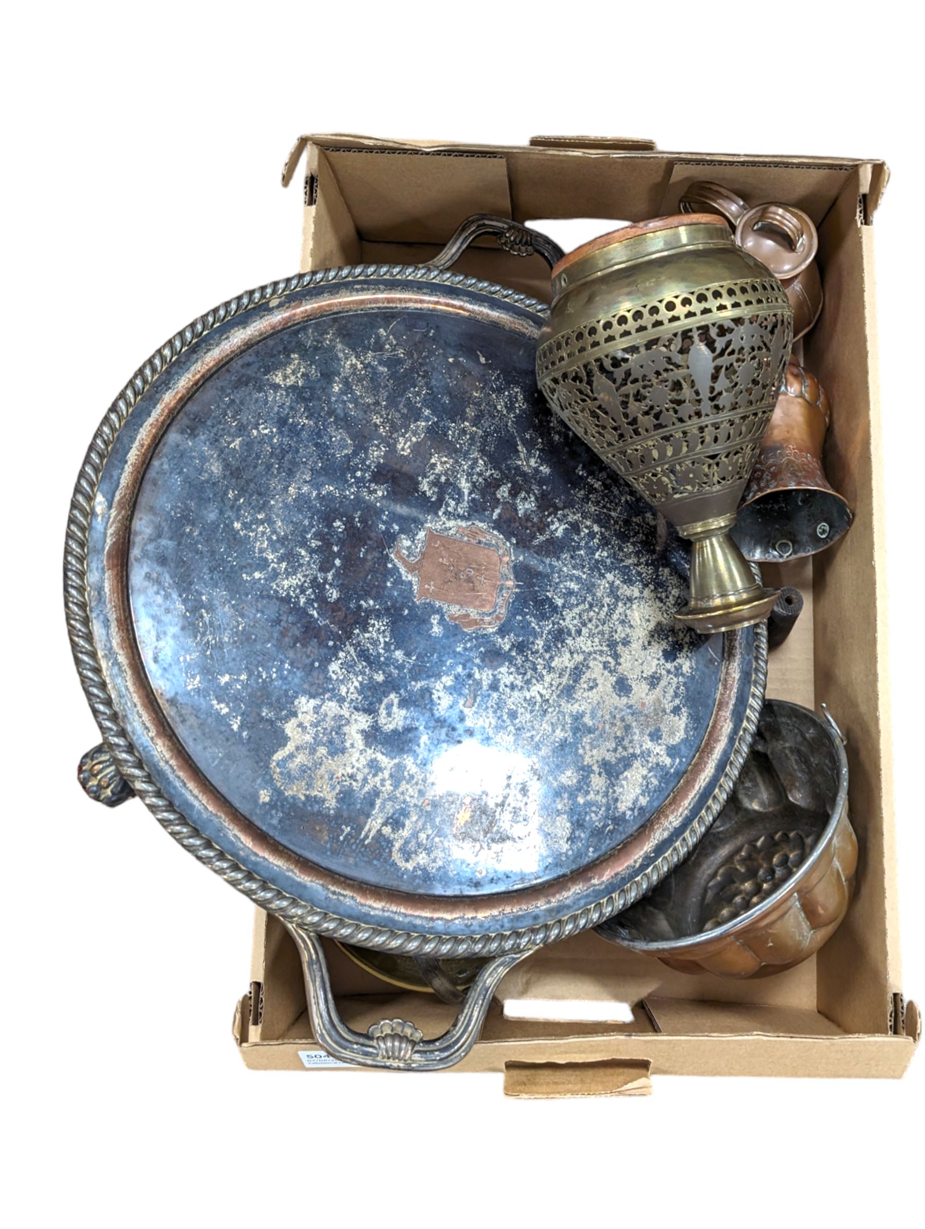 Large silver plated footed twin handled tray, engraved with crest to centre, together with a copper mould and other metalware 