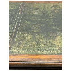 Large 10' 7'' late Victorian oak boardroom table, moulded rectangular top with inset green leather surface, on turned and reed moulded supports with brass and ceramic castors 