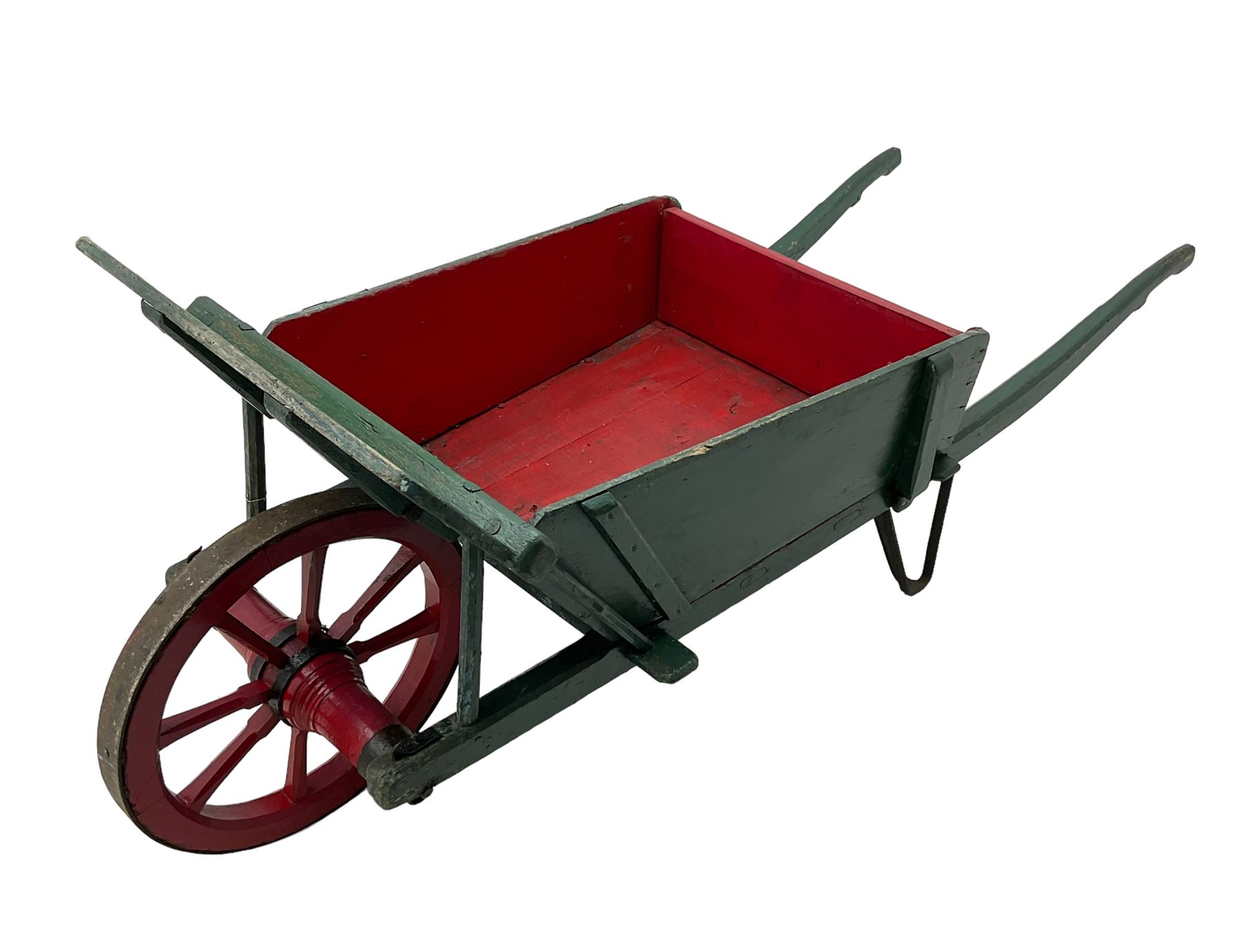 19th century green and red painted wooden wheelbarrow, flat bed with removable sides and back, wooden and wrought metal strap wheel 