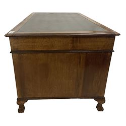 Georgian design twin pedestal desk, rectangular top with green leather inset, fitted with nine drawers, on cabriole supports with ball and claw feet 