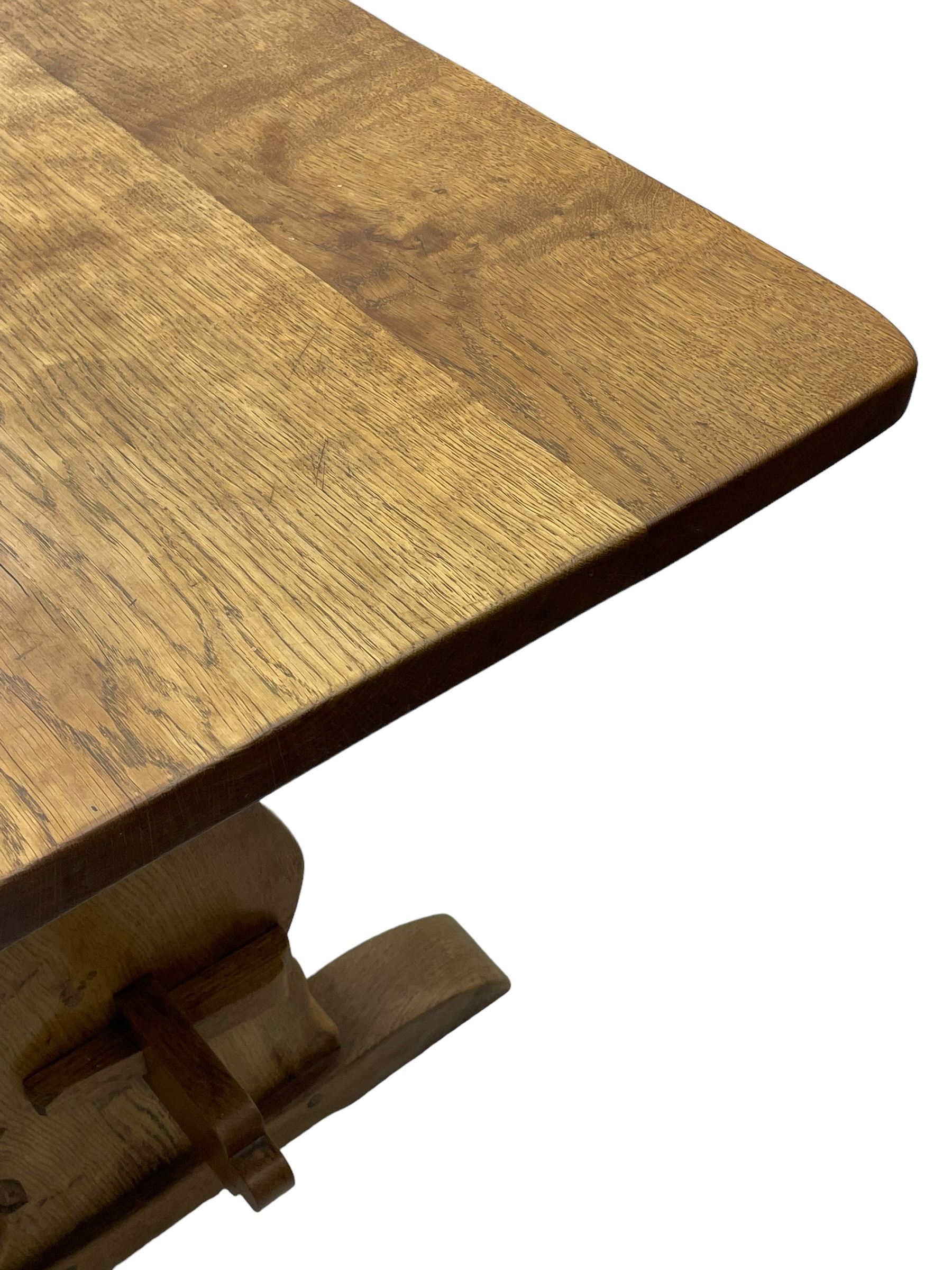 Gnomeman - oak dining table, rectangular adzed top, shaped end supports on sledge feet united by pegged stretcher, by Thomas Whittaker, Littlebeck, Whitby 