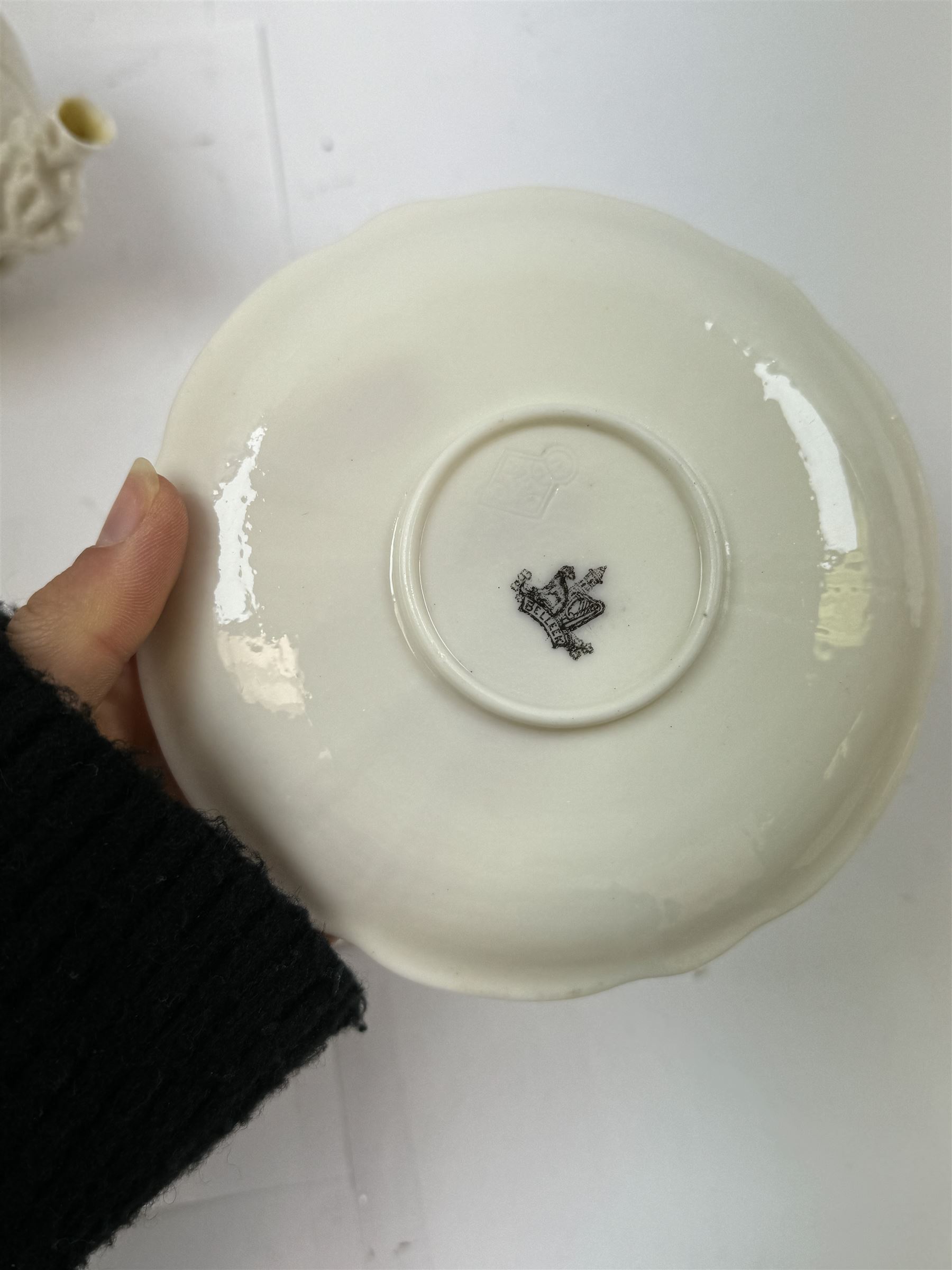 Belleek Sea Urchin teapot and sugar basin, together with Belleek Nautilus jug, small dish, teacup and saucer