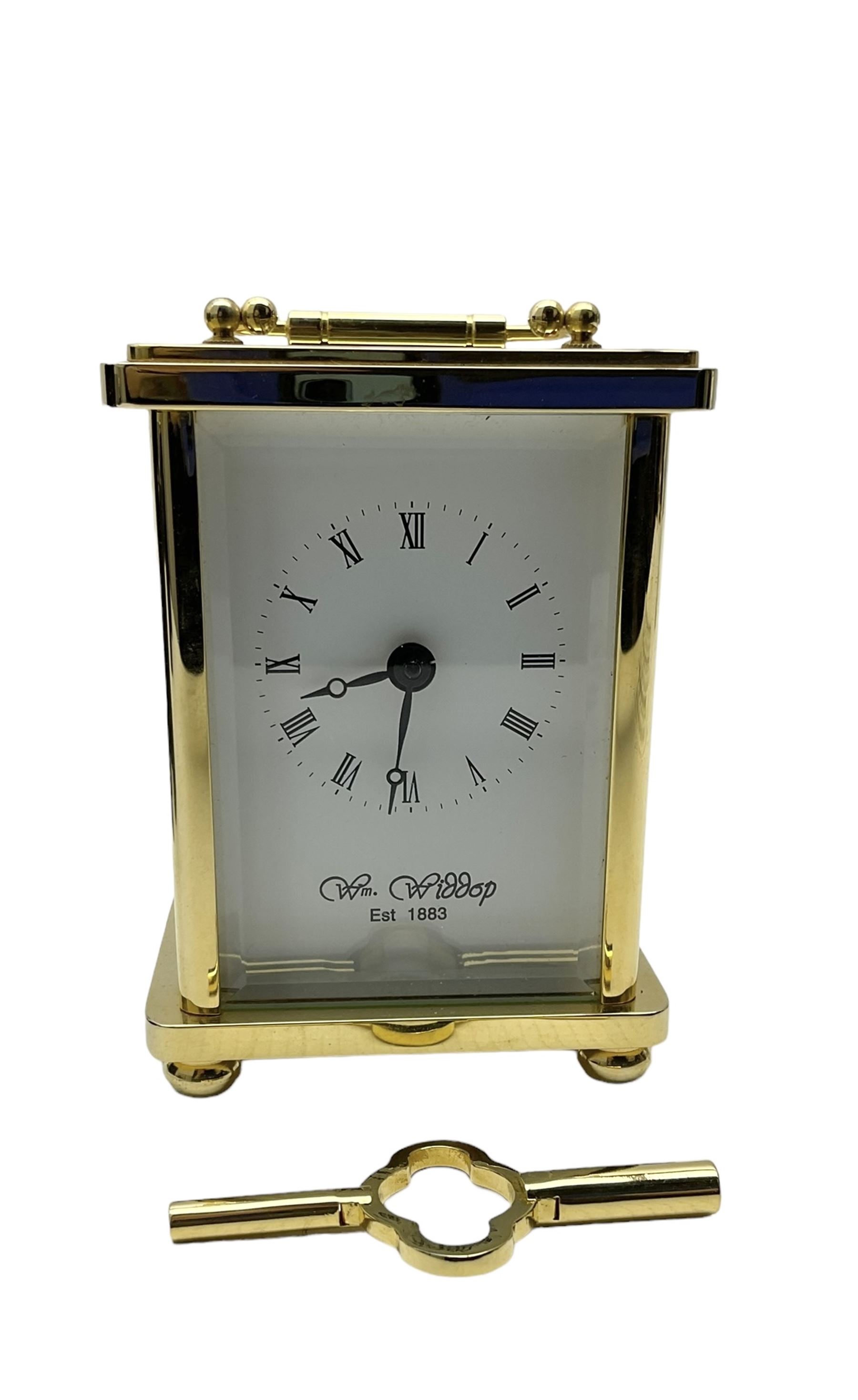 William Widdop - 20th century 8-day  brass cased carriage clock with an enamel dial, Roman numerals, minute track and steel moon hands, single train timepiece movement with a lever platform escapement, housed in a bespoke leather case, with key. 