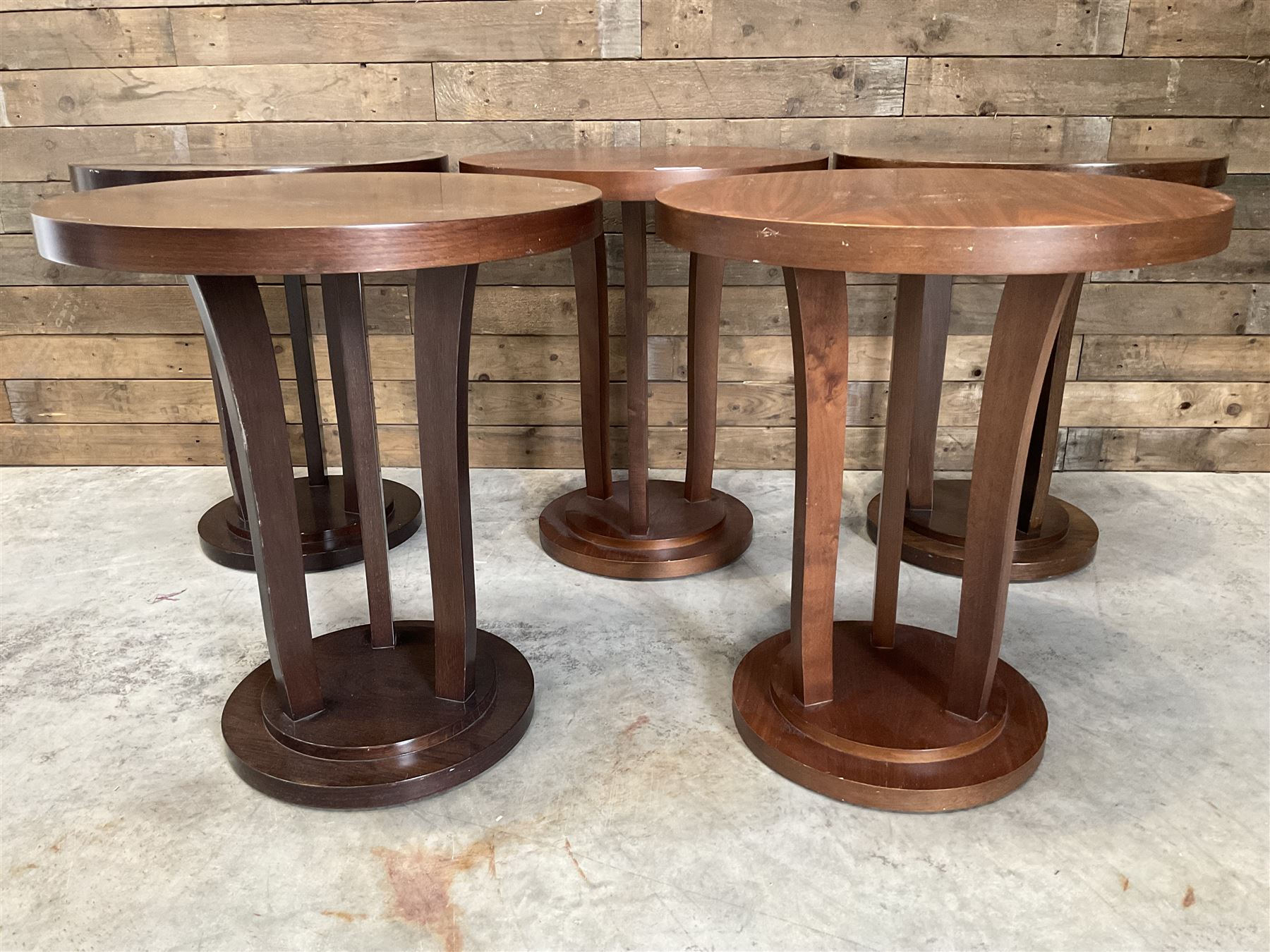 Five walnut circular bar or bedroom occasional tables