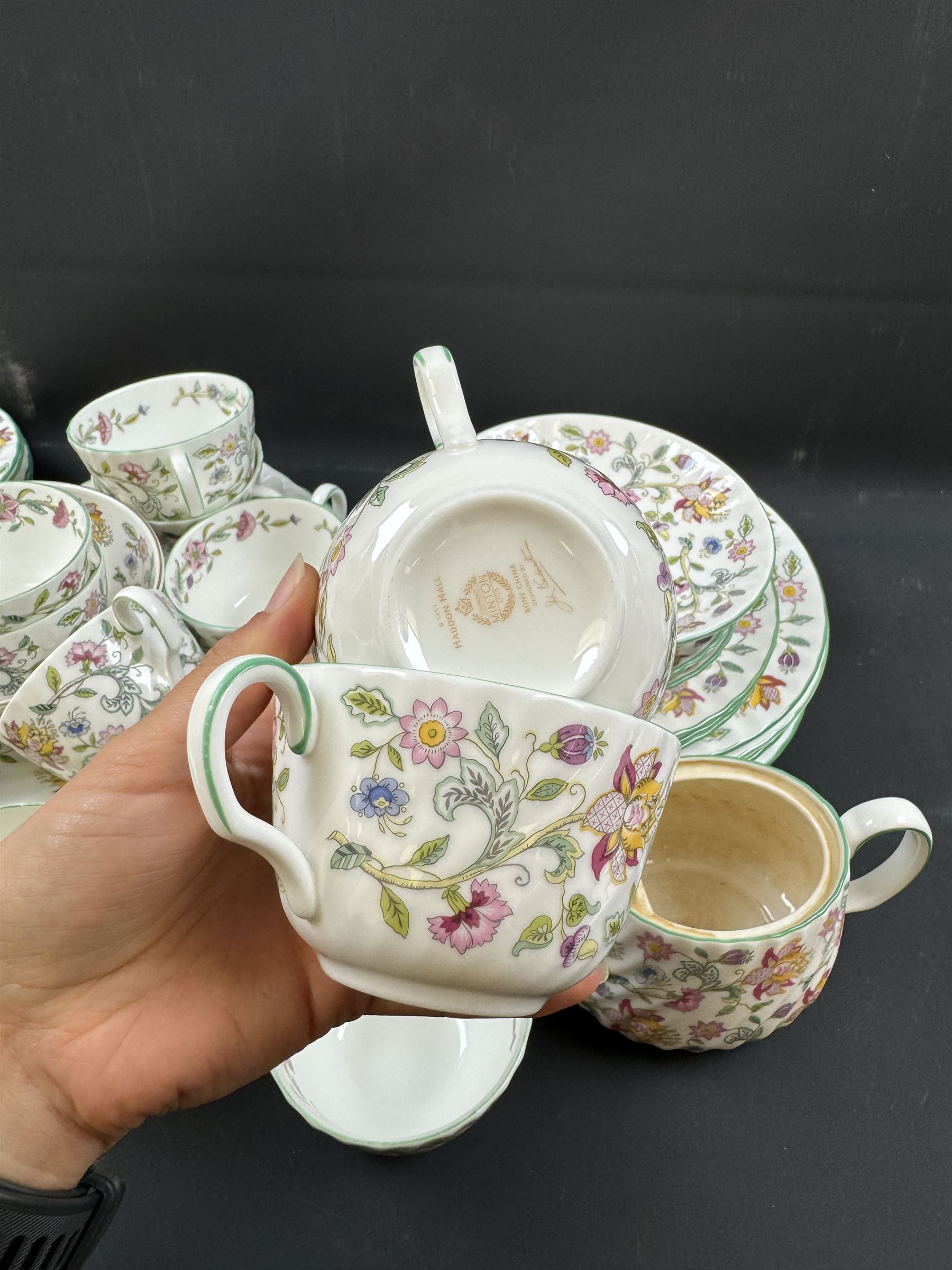 Minton Haddon Hall pattern part tea service, including milk jug, open sucrier, teacups and saucers, dessert plates etc