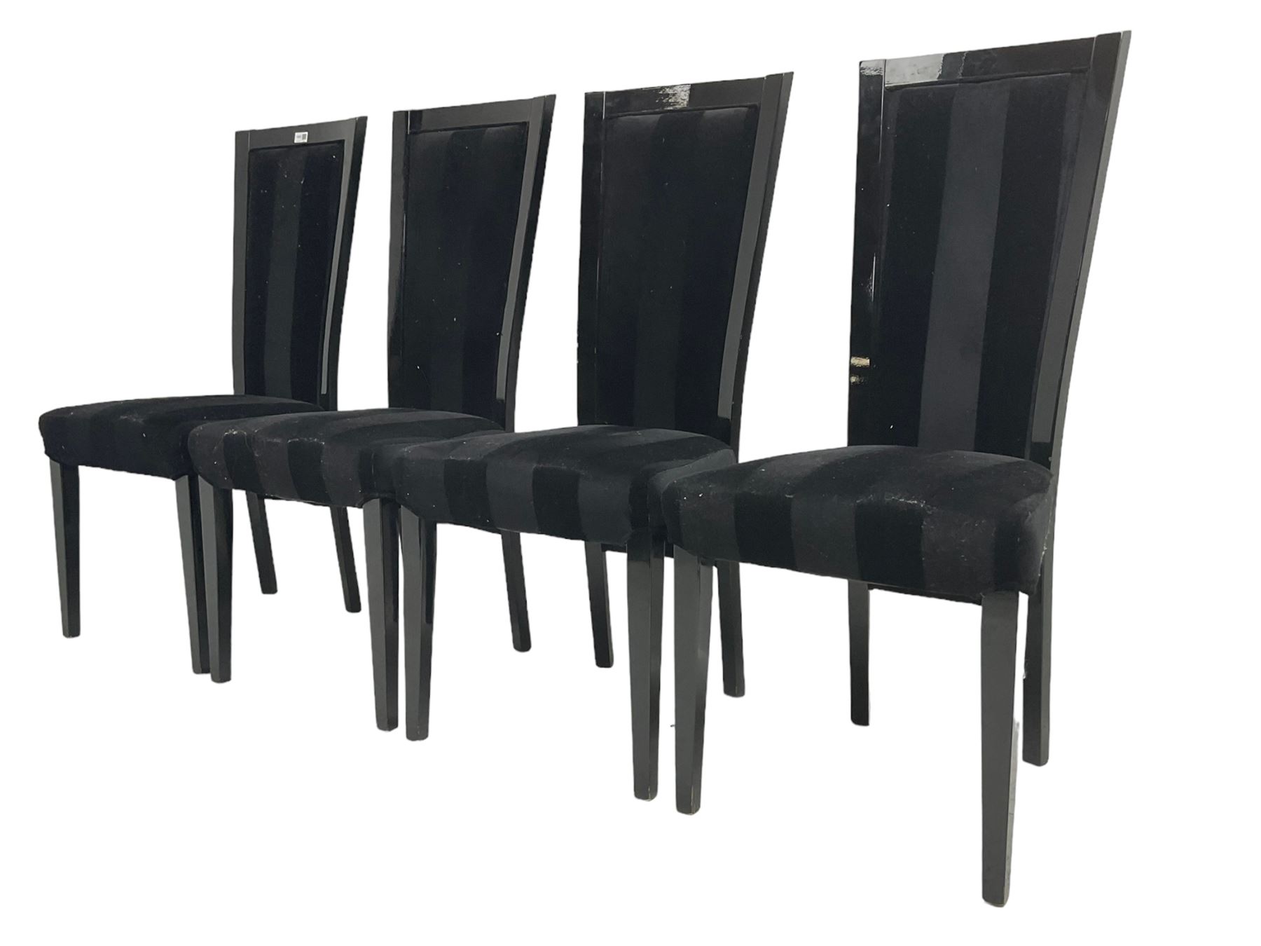 Set of four contemporary ebonised high back dining chairs, upholstered in black velvet fabric