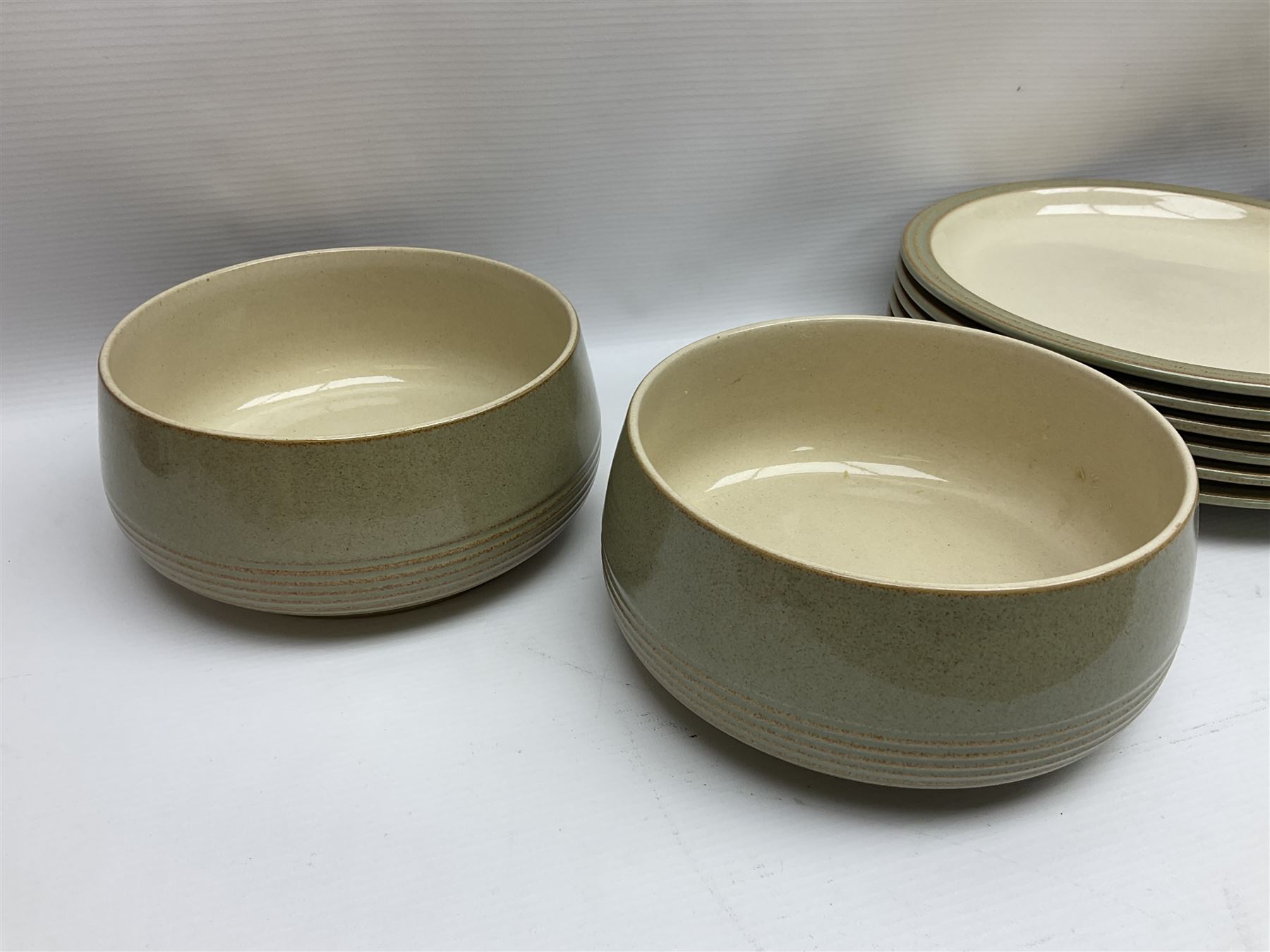 Denby tea and dinner wares, including bowls, jugs, tureens, side plates, dinner plates, serving dishes, cups and saucers, coffee pot, etc, all decorated with a green and brown mottled glaze, with printed marks beneath, in two boxes 