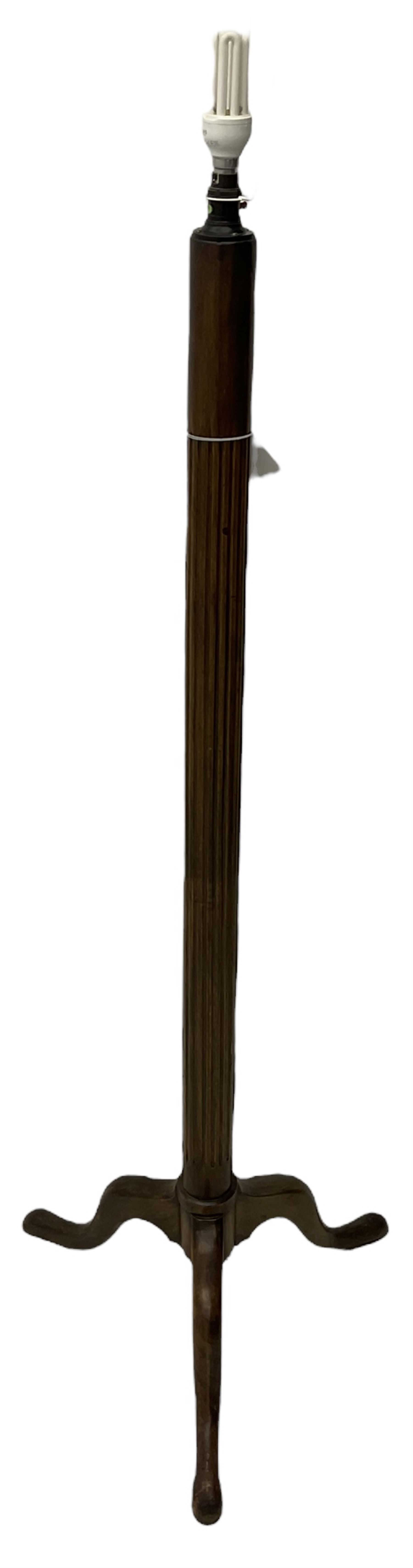 20th century mahogany standard lamp, fluted column on tripod base, with shade 