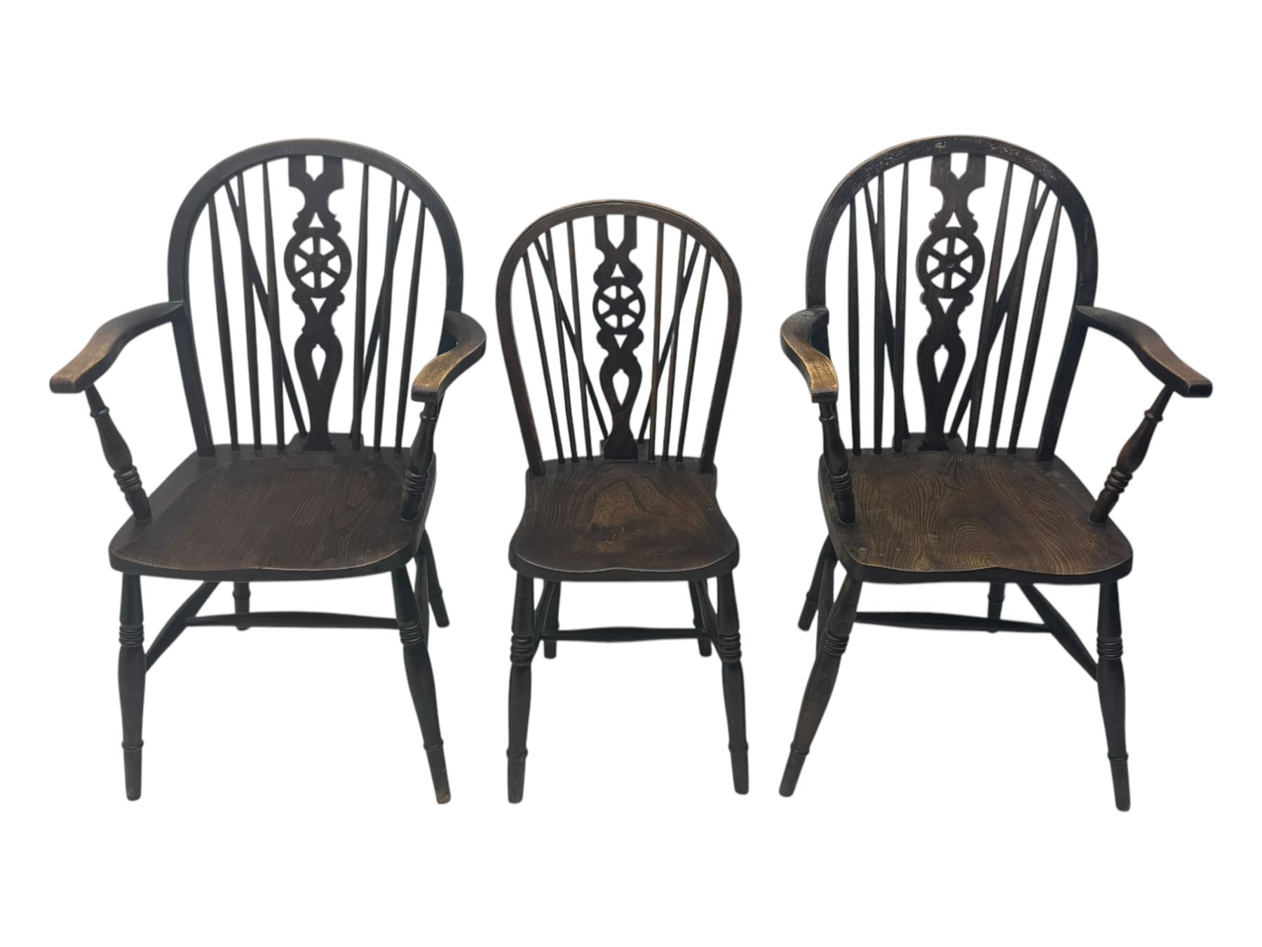 Set of six 19th century elm and ash dining chairs, hoop back with pierced wheel-shaped central splat, shaped saddle seat, raised on turned supports united by H-stretchers