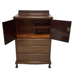 Early 20th century mahogany tallboy, double cupboard over three drawers, on ball and claw carved cabriole feet