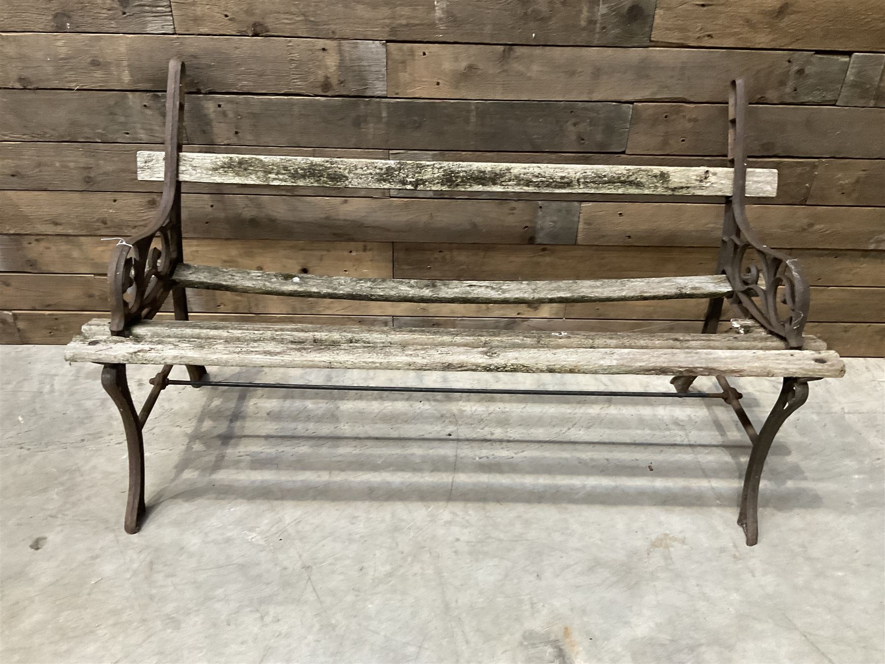 Pair of faux bois cast metal bench ends; together with wooden slatted bench with metal ends