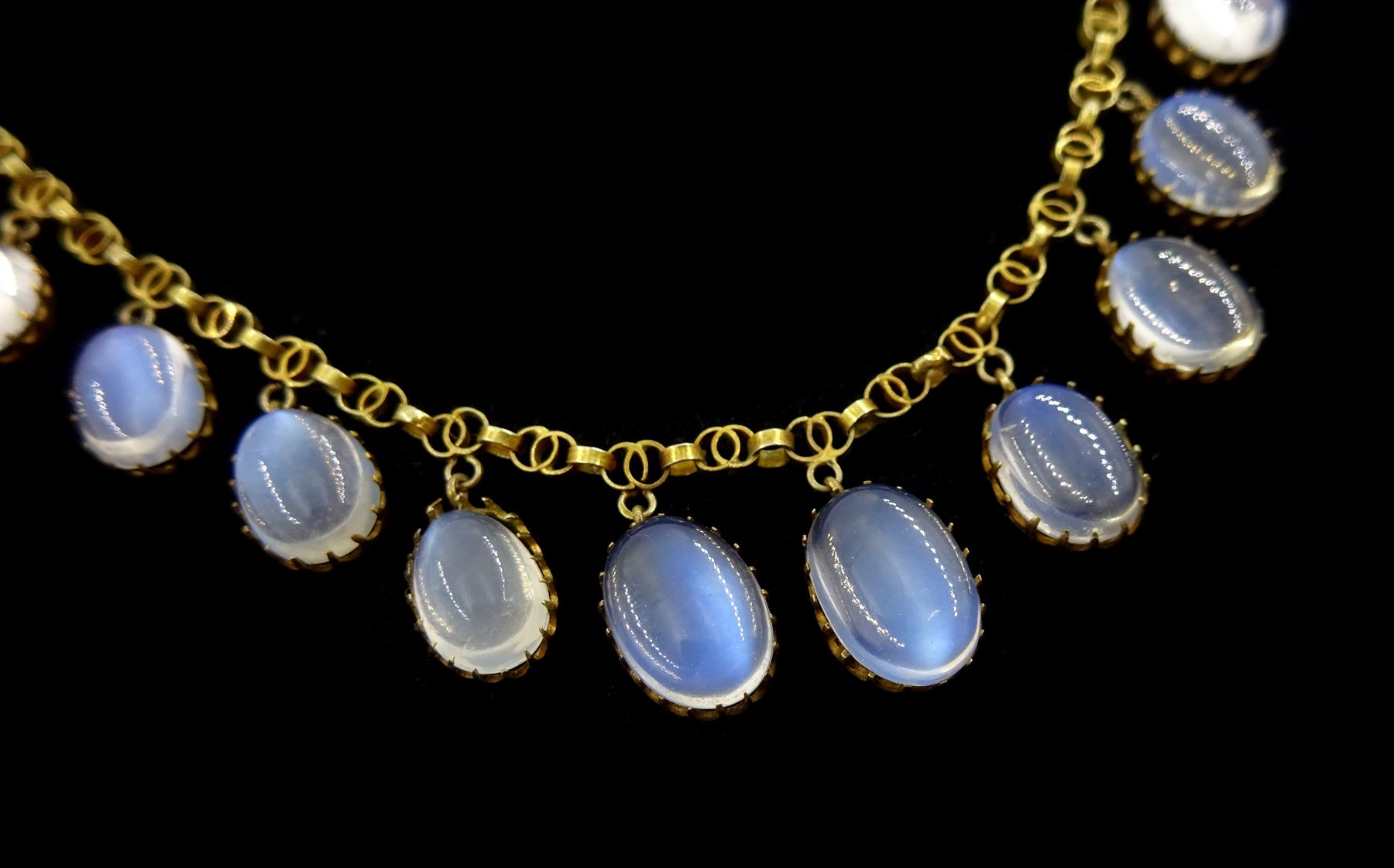 Early 20th century 9ct gold graduating moonstone fringe necklace, boxed