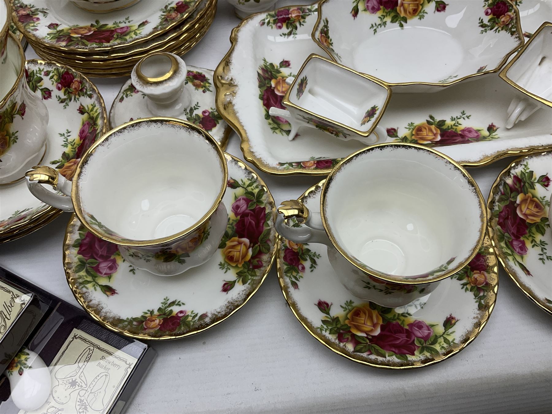 Royal Albert Old Country Roses pattern coffee service for six, comprising coffee pot, milk jug, cups and saucers, cake plate, together with miniature teapot, six teacups and saucers, six dinner plates, six side plates etc 