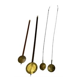 An assortment of four longcase pendulums and a painted longcase dial signed William Lister, Halifax