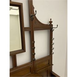 Late Victorian oak hall stand, bevelled mirror back, fitted with drawer
