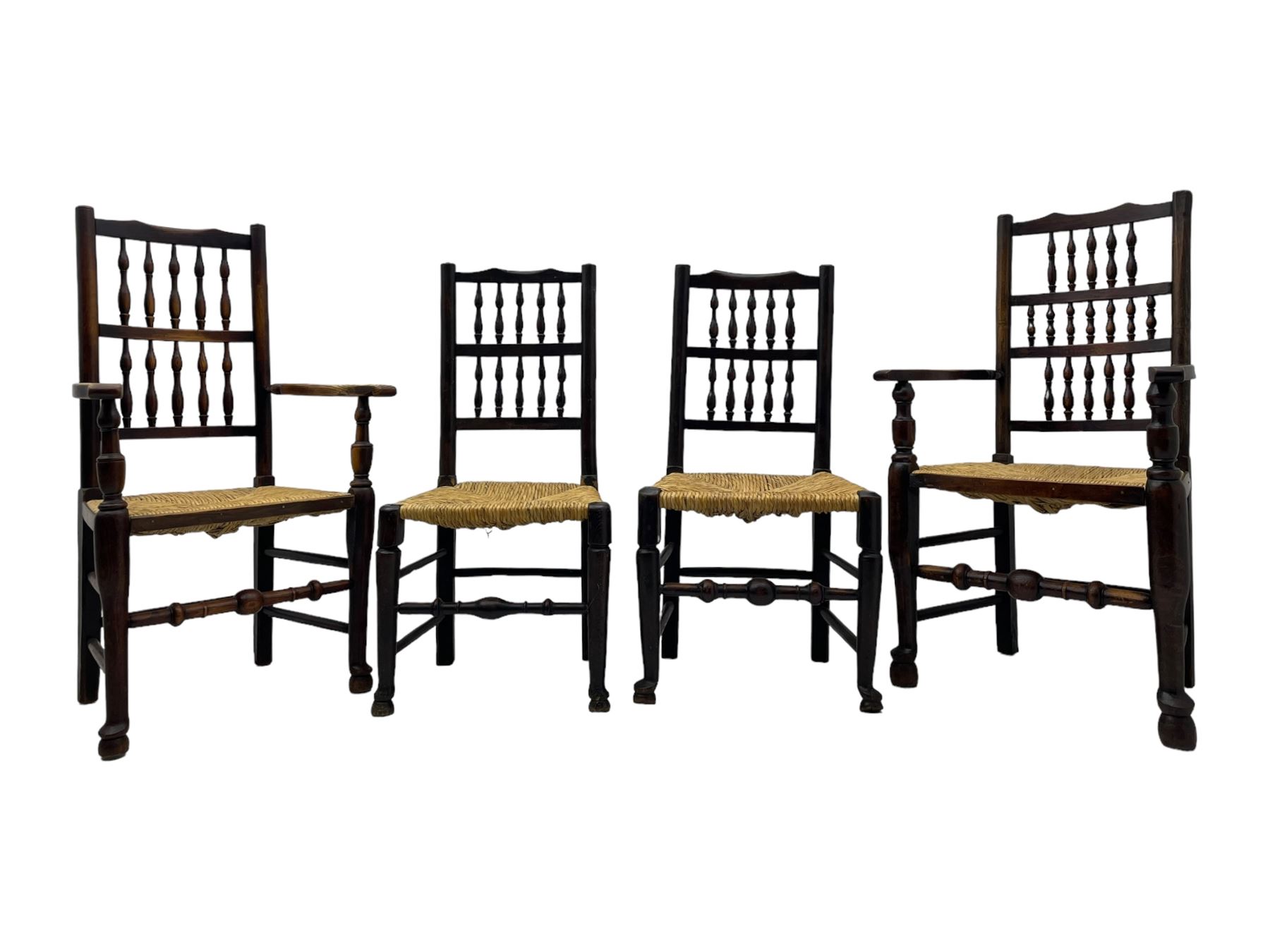 Matched set of twelve 19th century elm Lancashire spindleback dining chairs, shaped cresting rail over spindle back, rush seat, on turned supports united by turned stretchers, ring and globular turned front stretcher 