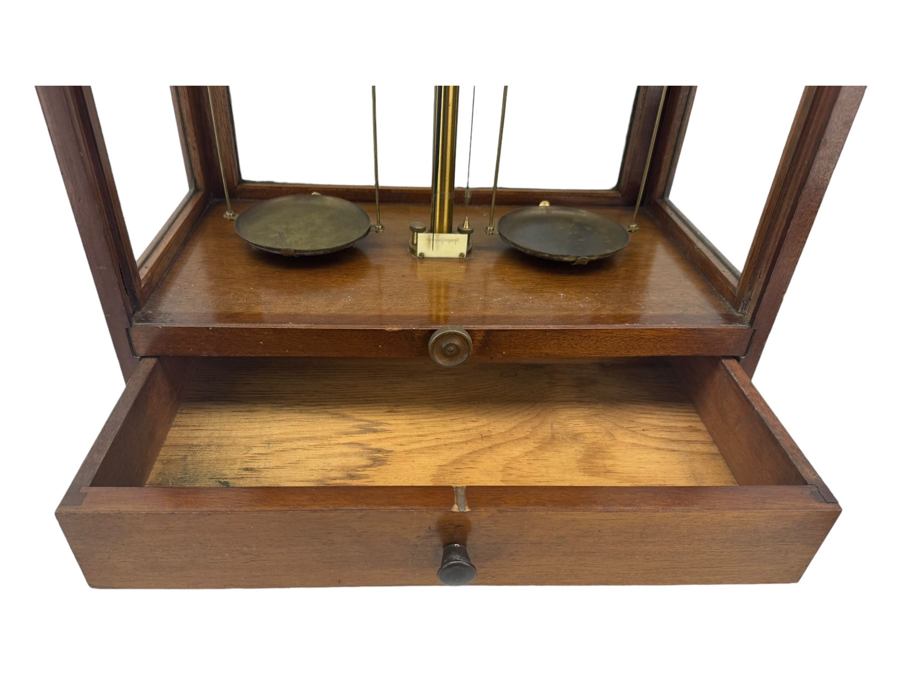 Early 20th century mahognay cased set of balance scales by James H Heal & Co Ltd with associated cased weights, H53cm x W44cm 