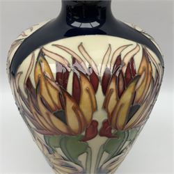 Moorcroft Sunflower vase, 2018 trial, of baluster form with fluted rim, tubelined and painted with sunflowers, on a cobalt blue ground, impressed and painted marks beneath, H23.5cm