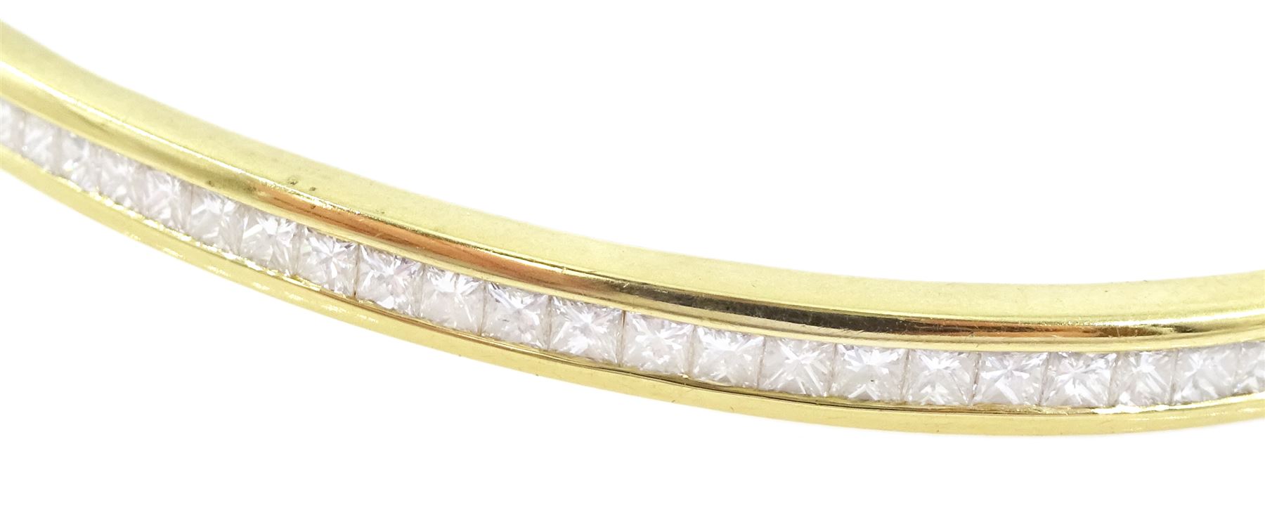 18ct gold diamond hinged bangle with forty-three channel set, princess cut diamonds, hallmarked