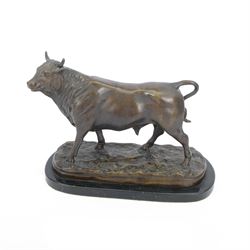 Bronze study of a standing bull, upon a marble oval base, H28cm 