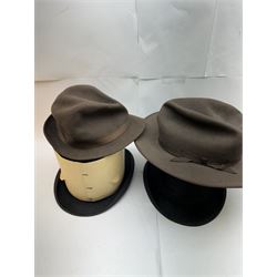 Akubra pure fur felt trilby hat, together with another trilby and two top hats, one by Woodrow and one by Dunn & Co