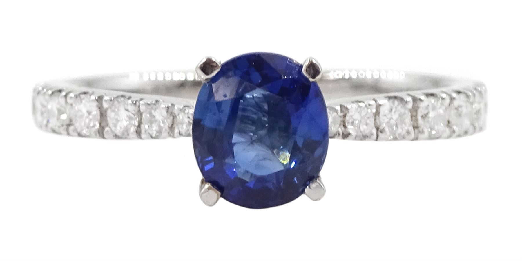 18ct white gold oval cut Ceylon sapphire ring, with diamond set shoulders, sapphire approx 0.90 carat