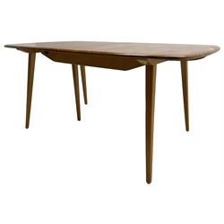 Ercol - light elm and beech 'Slide Leg Expanding Dining Table (444)', rectangular top with rounded corners, raised on tapered splayed supports, with two additional leaves