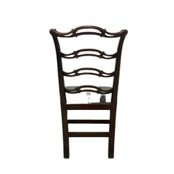 Set of twelve (10+2) Chippendale revival stained beech dining chairs, pierced waived ladder backs with over-stuffed over seats, on square moulded supports joined by stretchers