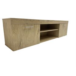 Light oak finish television stand, fitted with two cupboards and central shelf