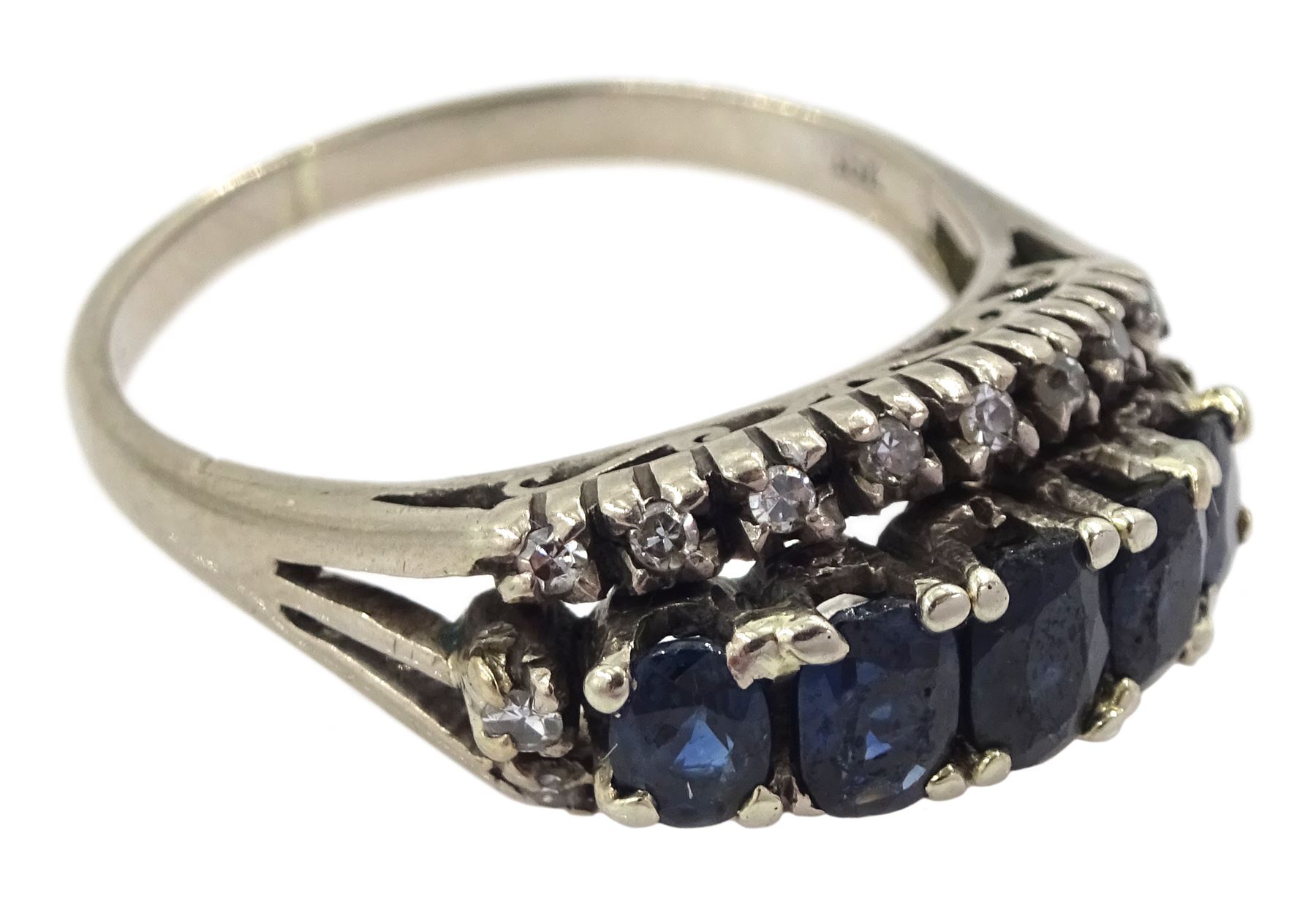 Three row graduating oval cut sapphire and diamond ring