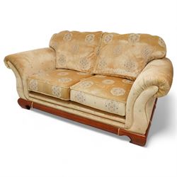 Three-seat sofa (W197cm, D103cm) and pair of matching armchairs (W100cm); upholstered in pale gold fabric decorated with Gul motifs, hardwood framed with polished base