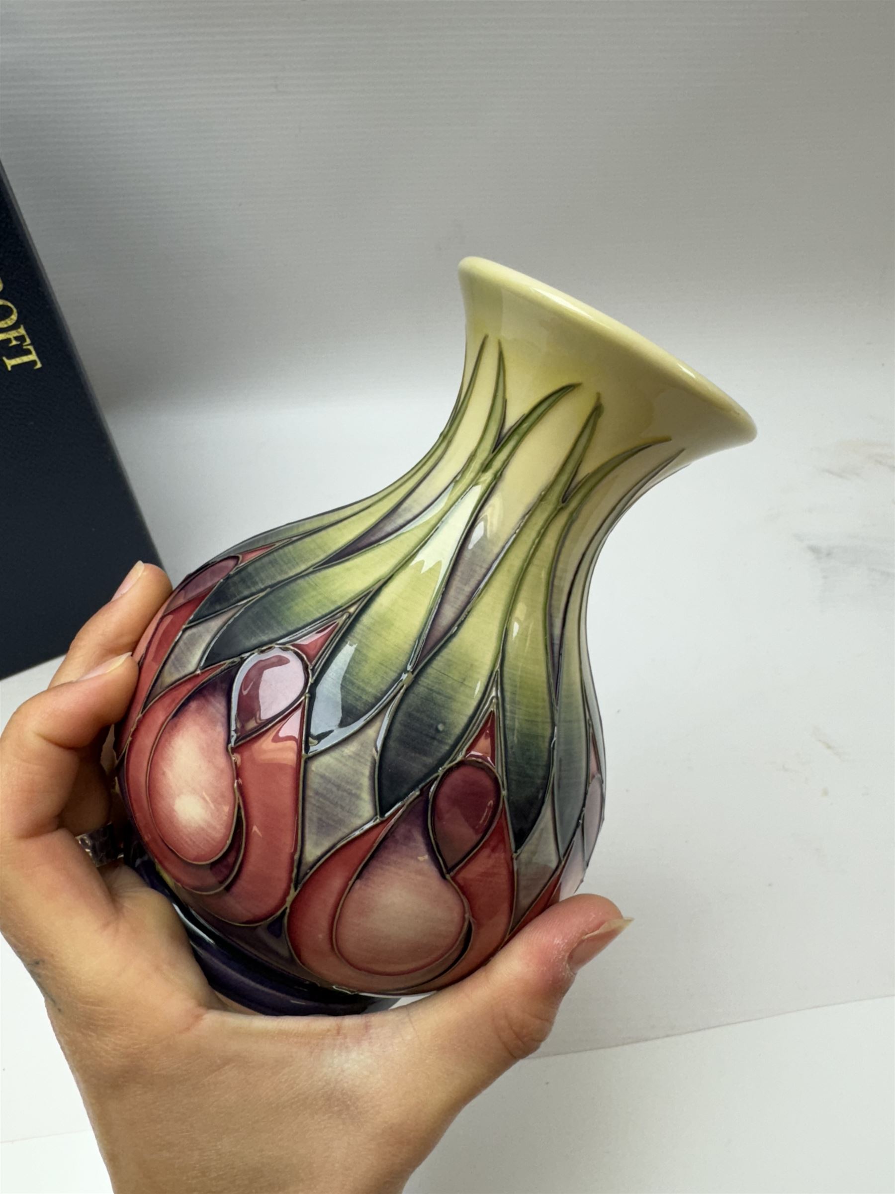 Moorcroft vase, decorated in April Tulip pattern, with markers mark beneath, with original box H16cm