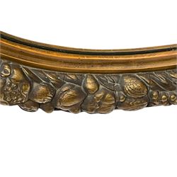 20th century giltwood and gesso oval wall mirror, the frame decorated with moulded fruit and foliage, bevelled mirror plate 