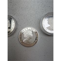 Three Queen Elizabeth II Isle of Man one ounce fine silver coins, comprising 2016, 2018 one angels and 2018 one noble 
