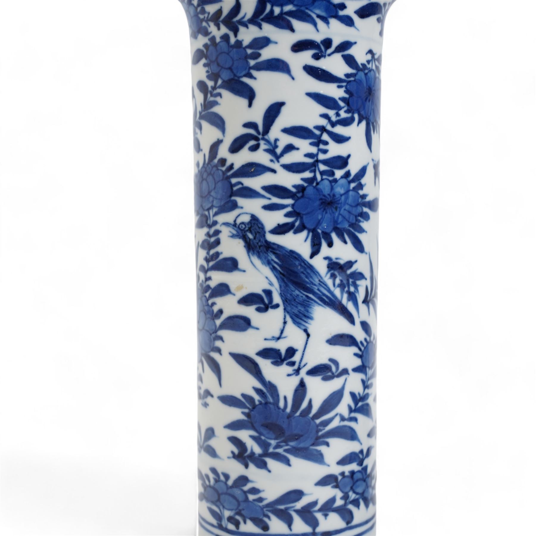 Pair of 19th century Chinese blue and white sleeve vases, each of cylindrical form with flared rim, painted with exotic birds amongst foliate sprays, four character Kangxi mark beneath, H21cm