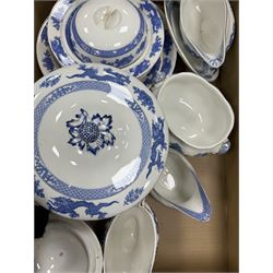 Extensive tea and dinner service of Booths and Cauldon dragon pattern, including, teapots, coffee pots, jugs, toast racks, bowls, dinner plates, platters, soup tureen etc 