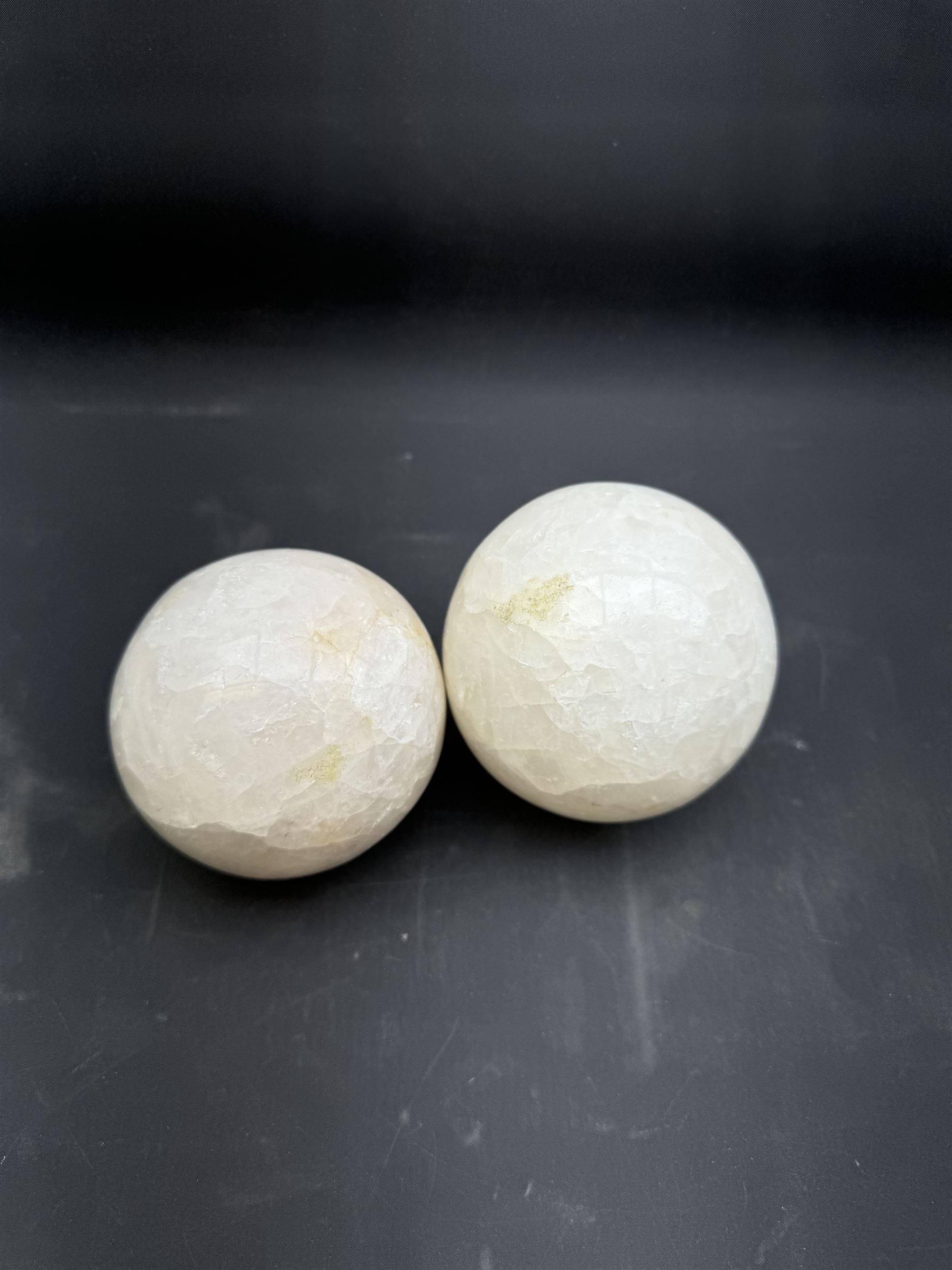 Pair of milk calcite spheres, D10cm 