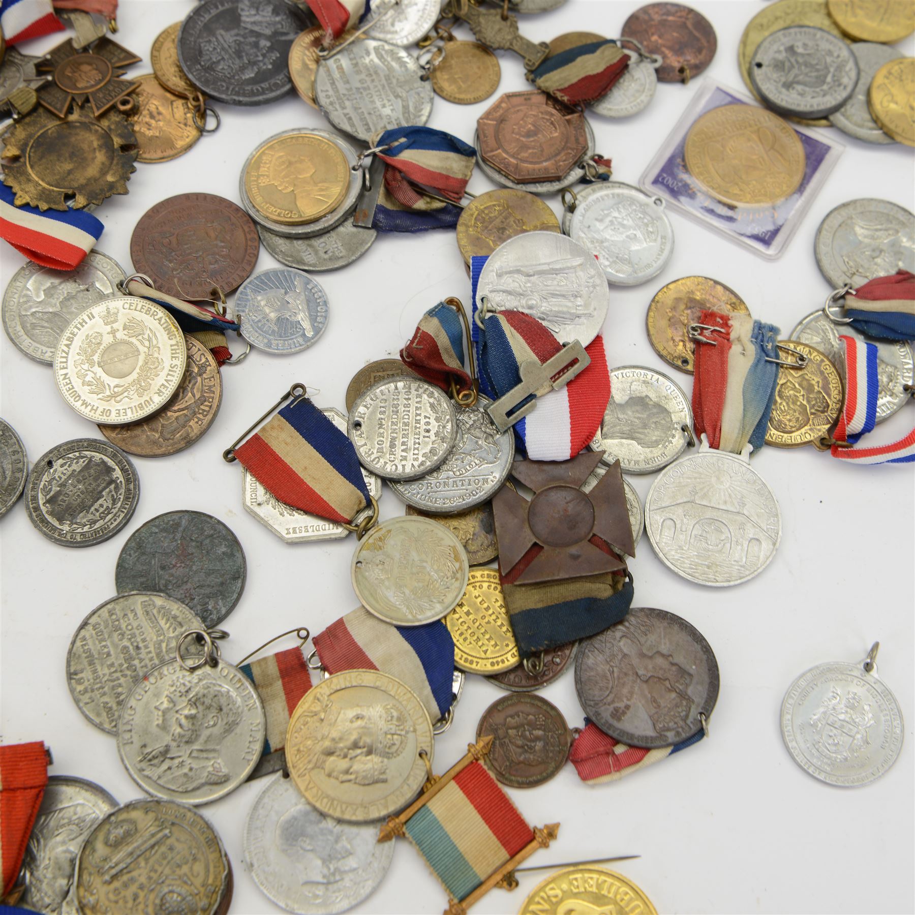 Quantity of commemorative medals or medallions, including Queen Victoria Diamond Jubilee small silver medallion, King Edward VII and  King George V Coronation small silver medallions, various other official and unofficial commemoratives for various Royal events with various monarchs through to Queen Elizabeth II 