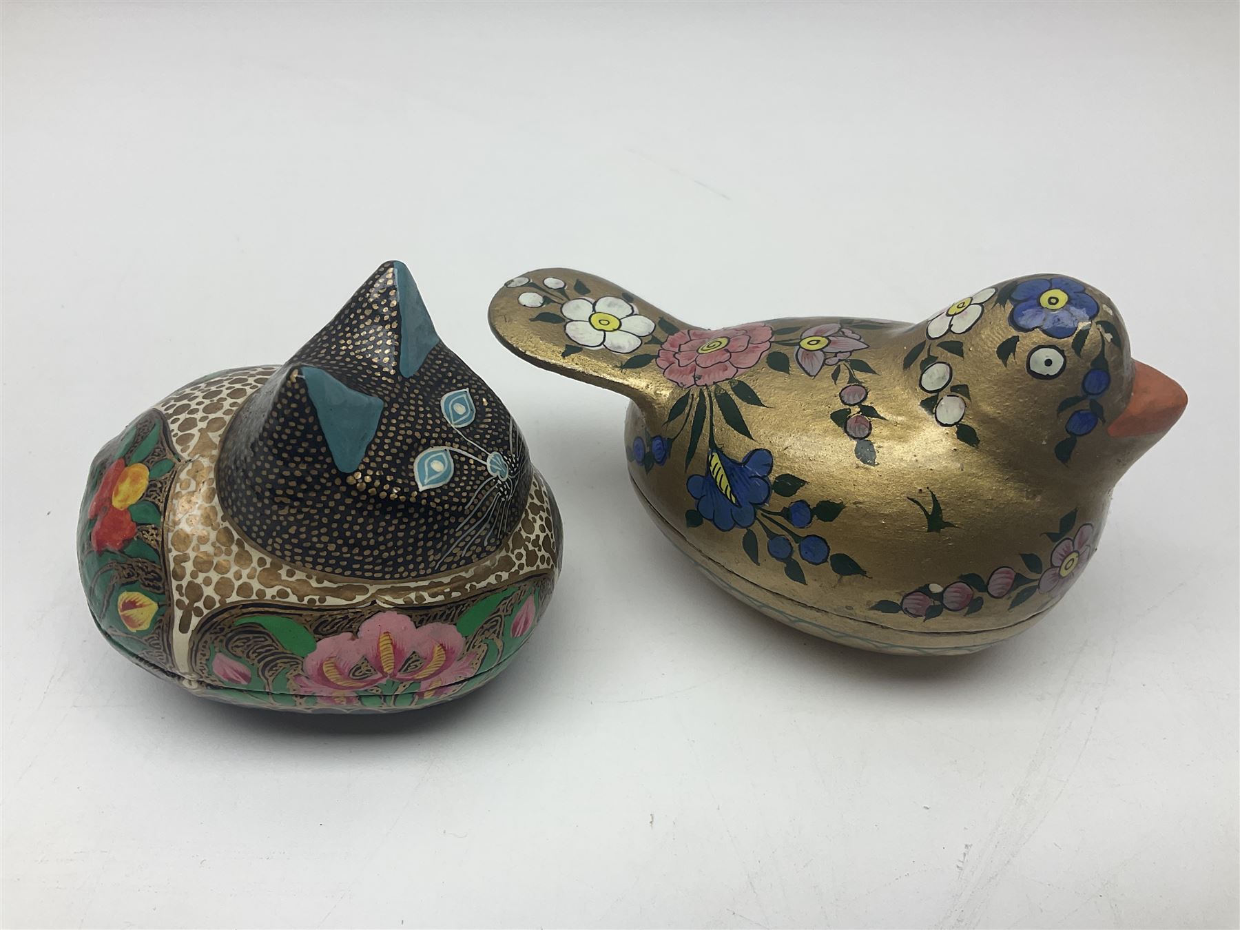 Eight lacquered boxes, including novelty painted boxes in the form of cats, rabbit and a bird, rabbit H7cm, L9cm