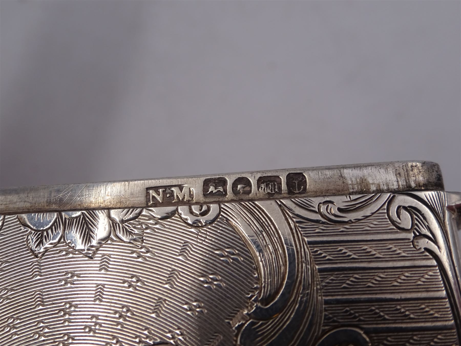 Victorian silver card case, of rectangular form with shaped edges, engine turned and floral decoration, with engraved hallmarked Nathaniel Mills, Birmingham 1845, H10cm